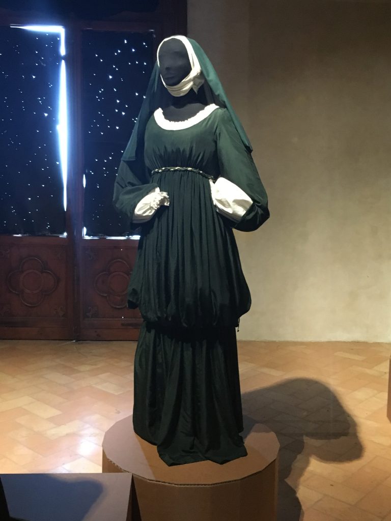 medieval costume in museum in Assisi