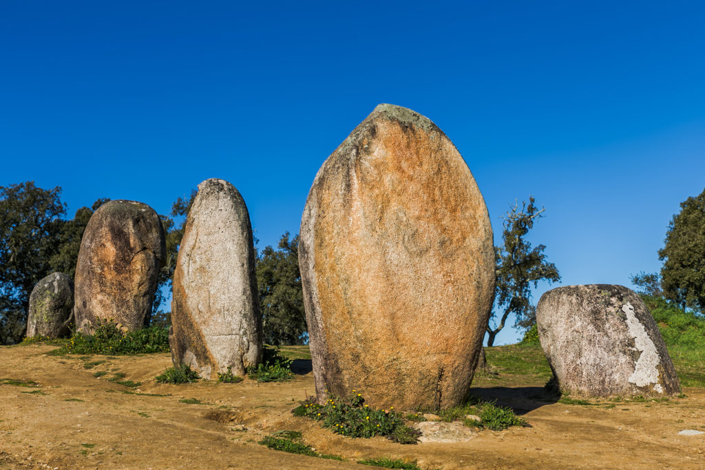 Standing stones of the Almendres Cromlech near  Évora, one of the seven recommended prehistory sites in Europe