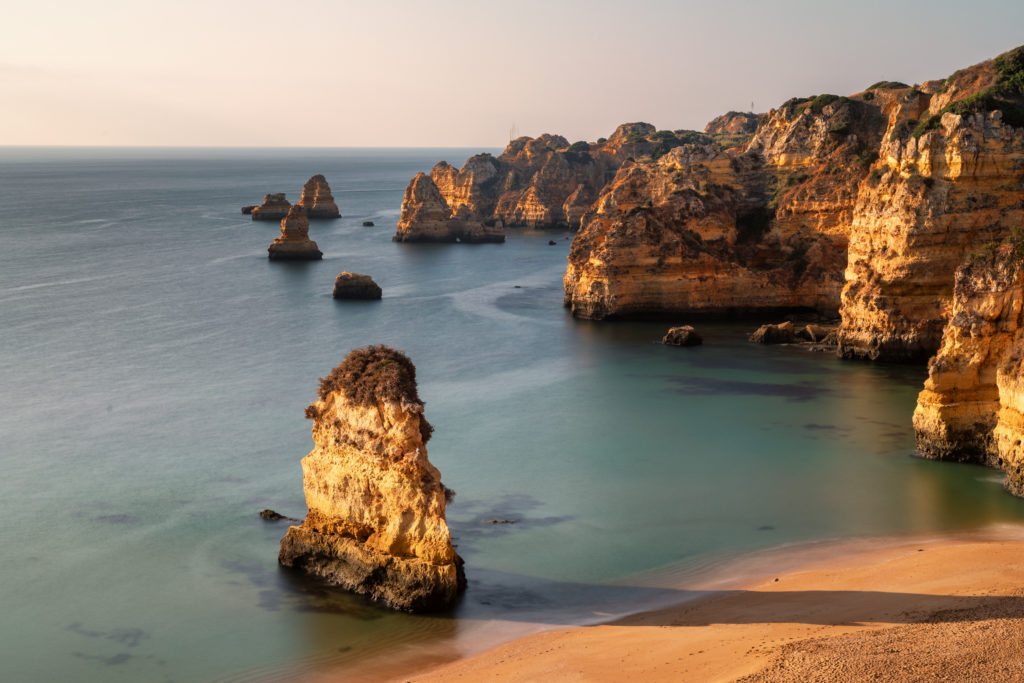 Cliffs and beaches in the Algarve - a region for travel in Portugal