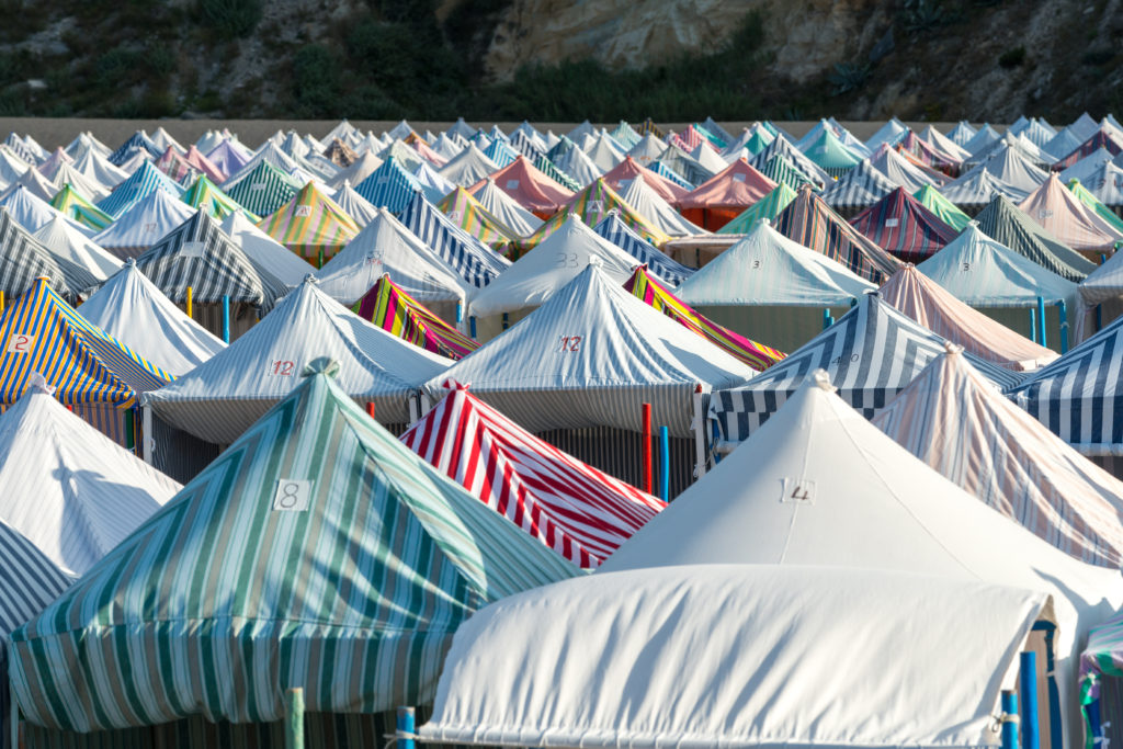Striped tents on the beach at Nazare