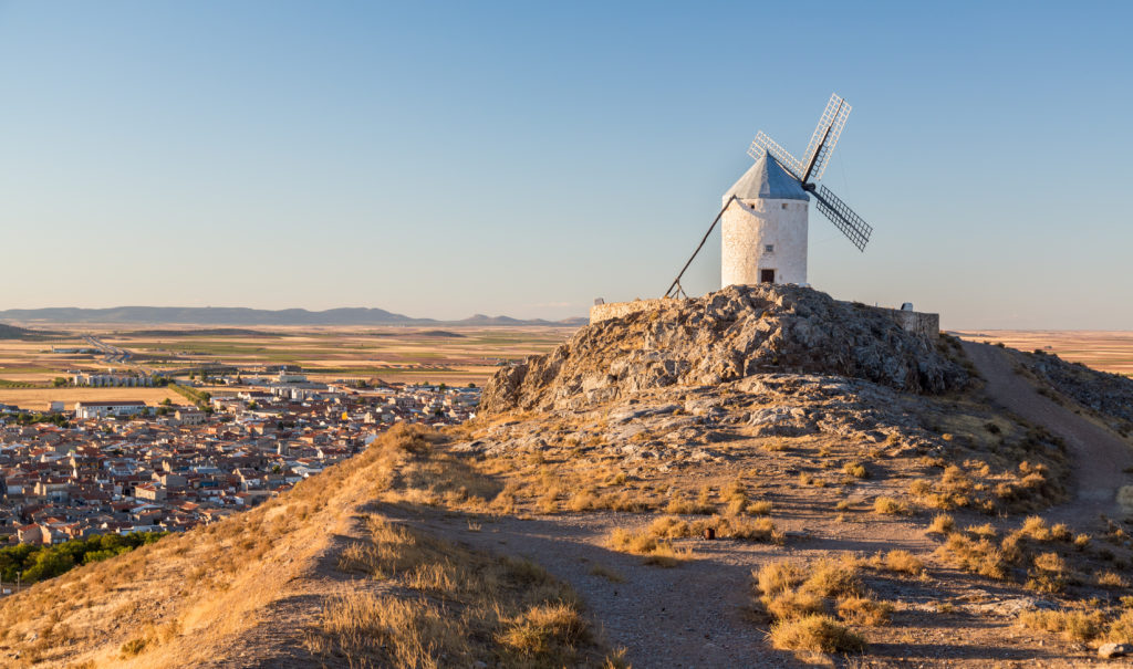 An iconic view of a windmill on a desolate plain in Spain 