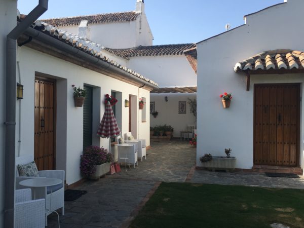 Courtyard at the HJotel Cortijo-las-Piletas, a charming hotel in Spain