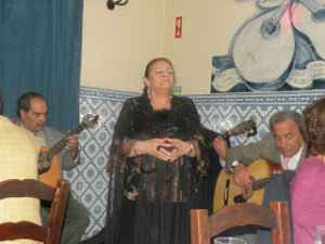 A fado singer in an Alfama restaurant in Lisbon
