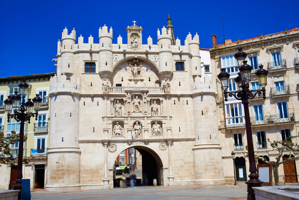 View of the Arco de Santa Maria, an ornately carved wall in Burgos, Spain
