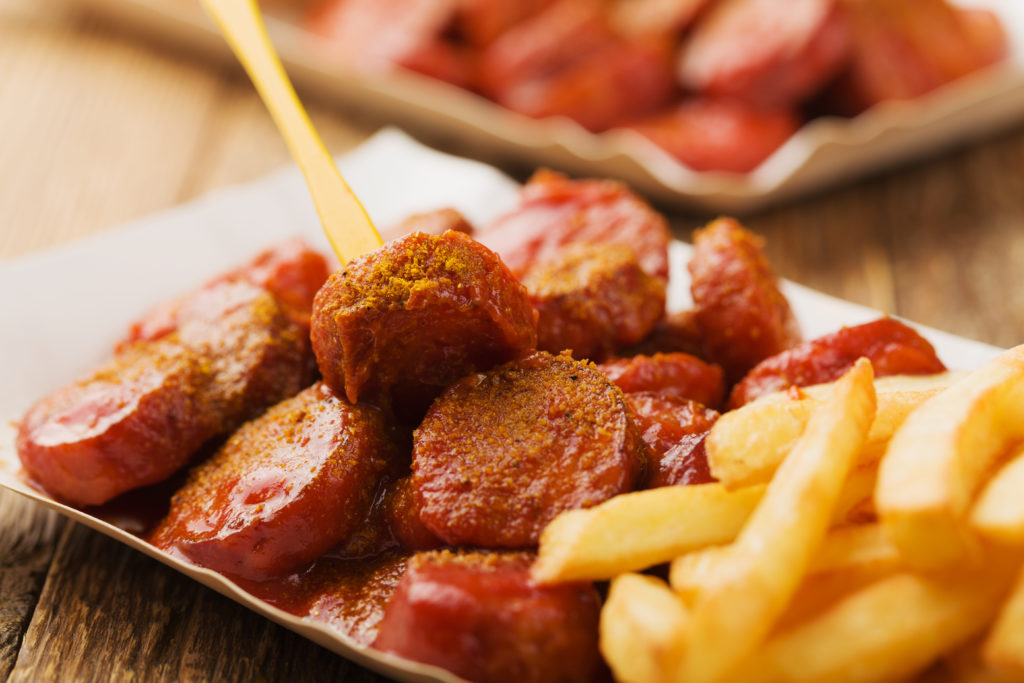 Plate of currywurst--street food in Berlin