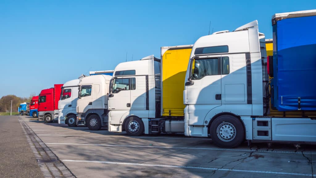 trucks in a truck stop parking lot in Europe