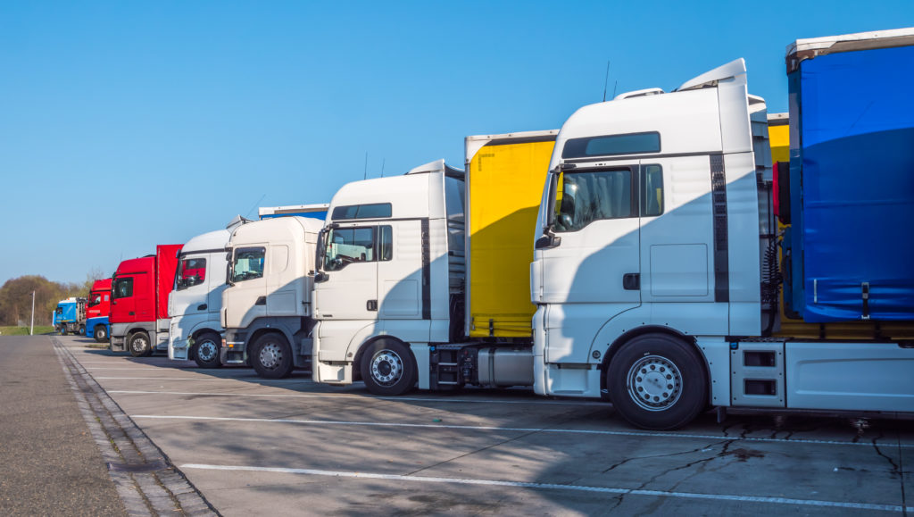 trucks in a truck stop parking lot in Europe