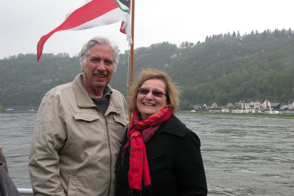 Carol Cram & Gregg Simpson on the deck of the K-D Rhine boat on the Rhine River.