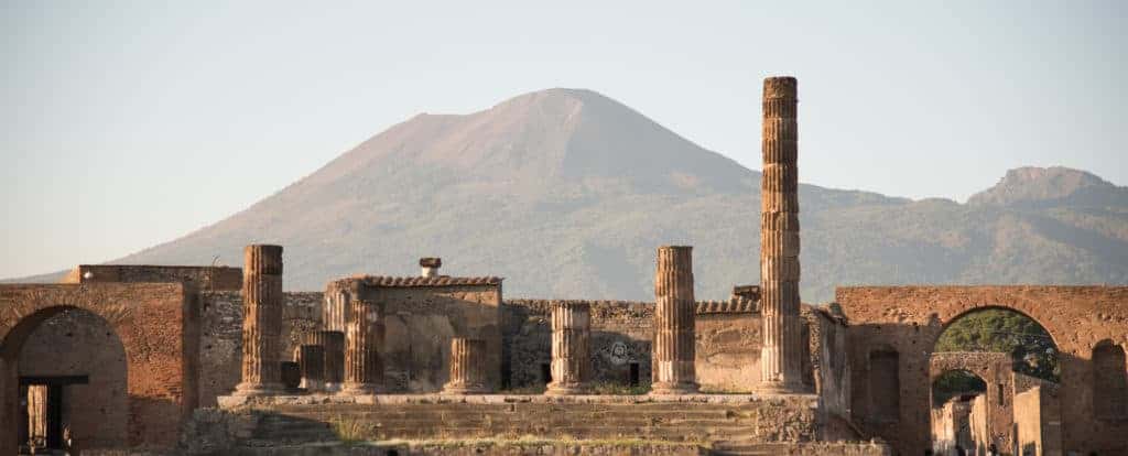 Mount Vesuvius looming behind the ruins of the Forum in Pompeii
