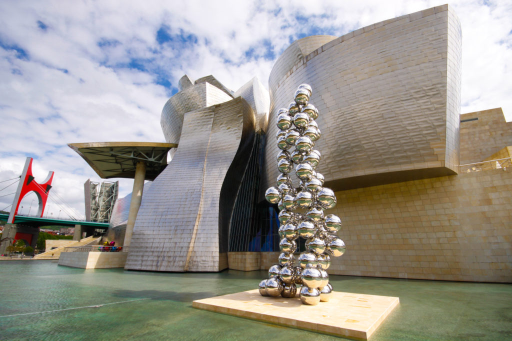 Sculpture called Tall Tree and the Eye by Anish Kapoor Outside the Guggenheim Museum in Bilbao, Spain