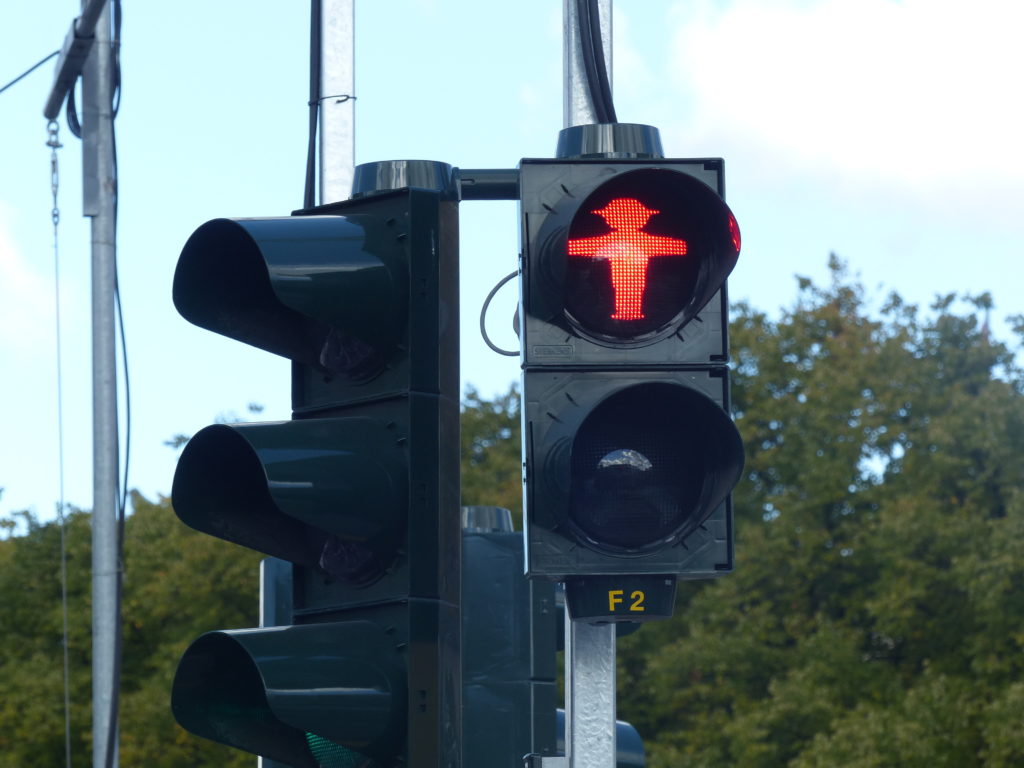 Red Ampelmänn pedestrian stop sign in Germany