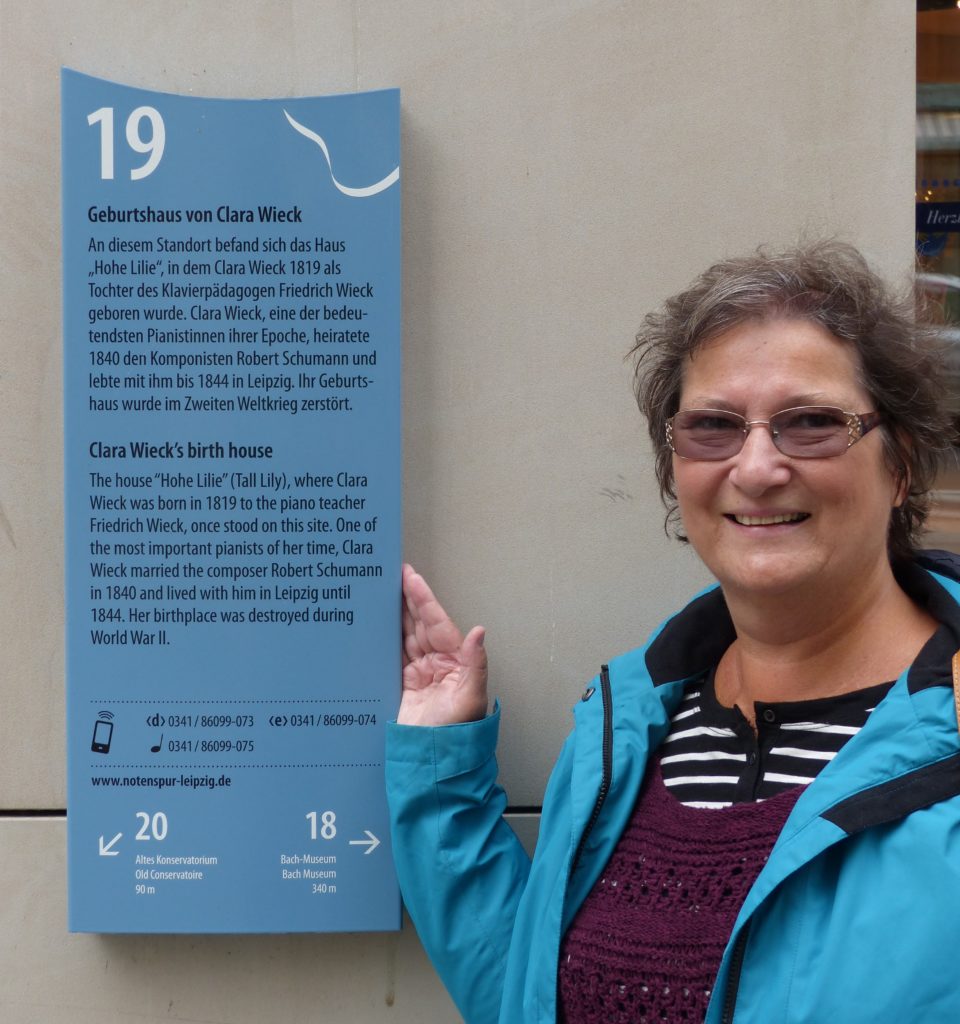 Author next to the plaque designating Clara Wieck's birthplae in Leipzig, Germany