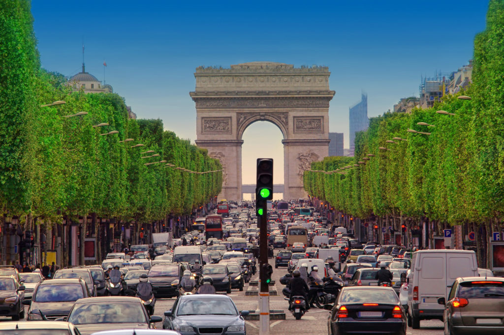 View of a traffic jam in Paris with the Arc de Triomphe in the center