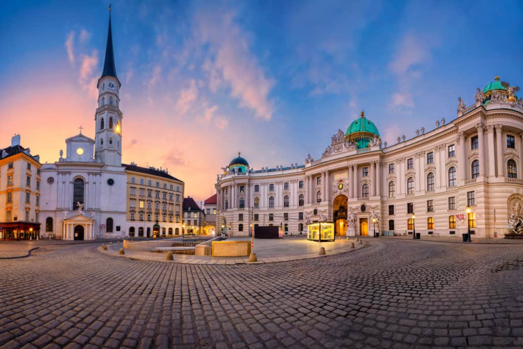 Cityscape image of Vienna, Austria with St. Michael's Square at sunrise