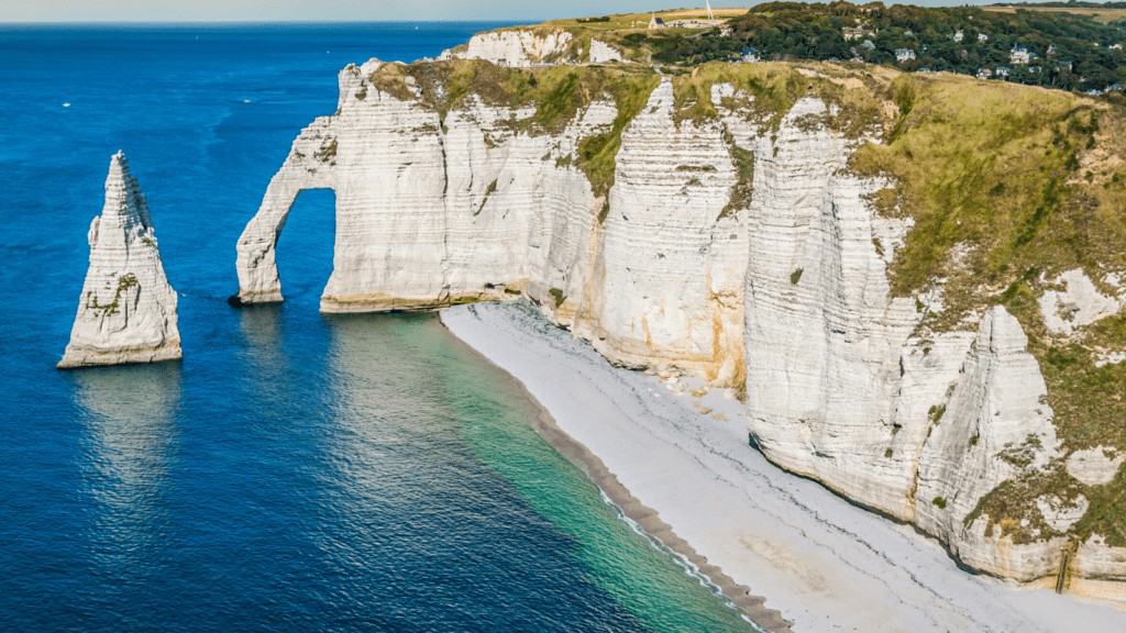 View of the stunning white chalk cliffs of Étretat in Normandy