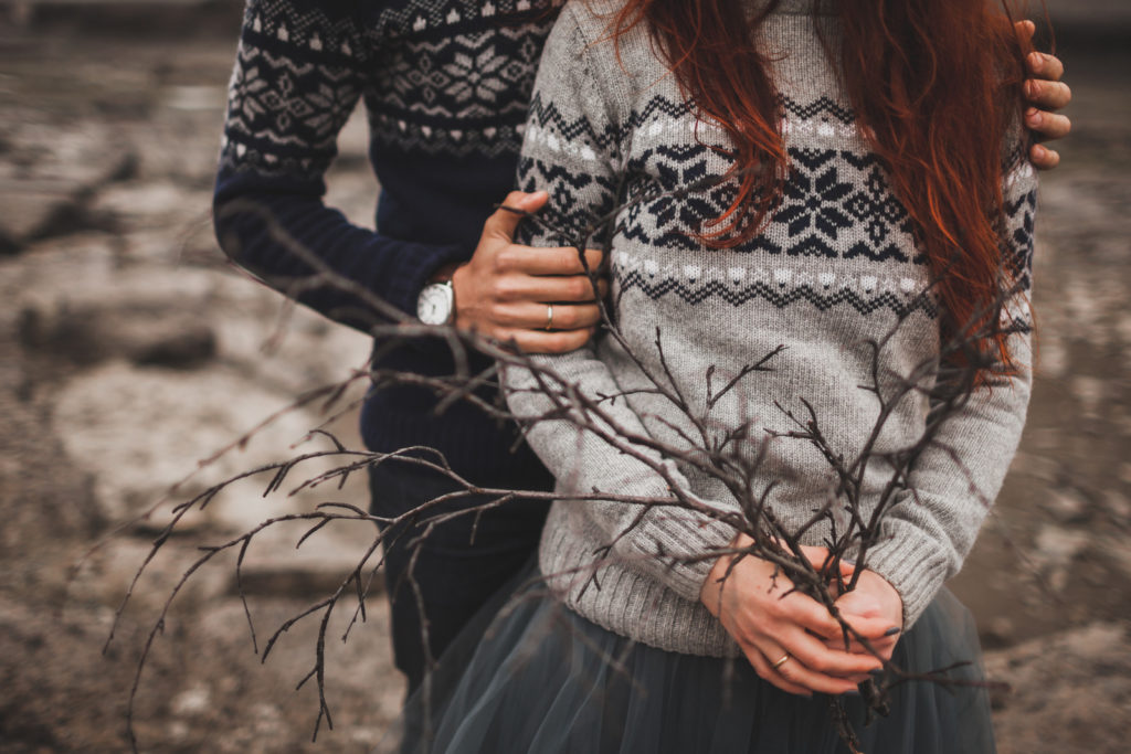 Two people wearing traditional Icelandic sweaters
