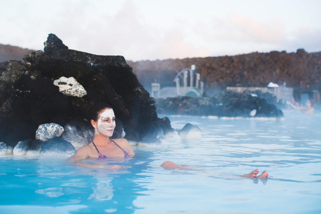Person relaxing in the Blue Lagoon in Iceland