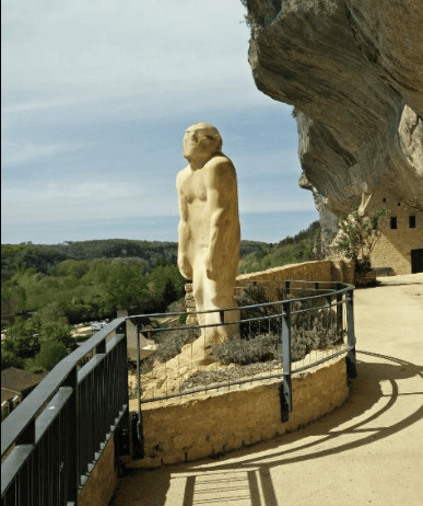 Statue of an early human outside the Musée National de Prehistoire in Les Eyzies