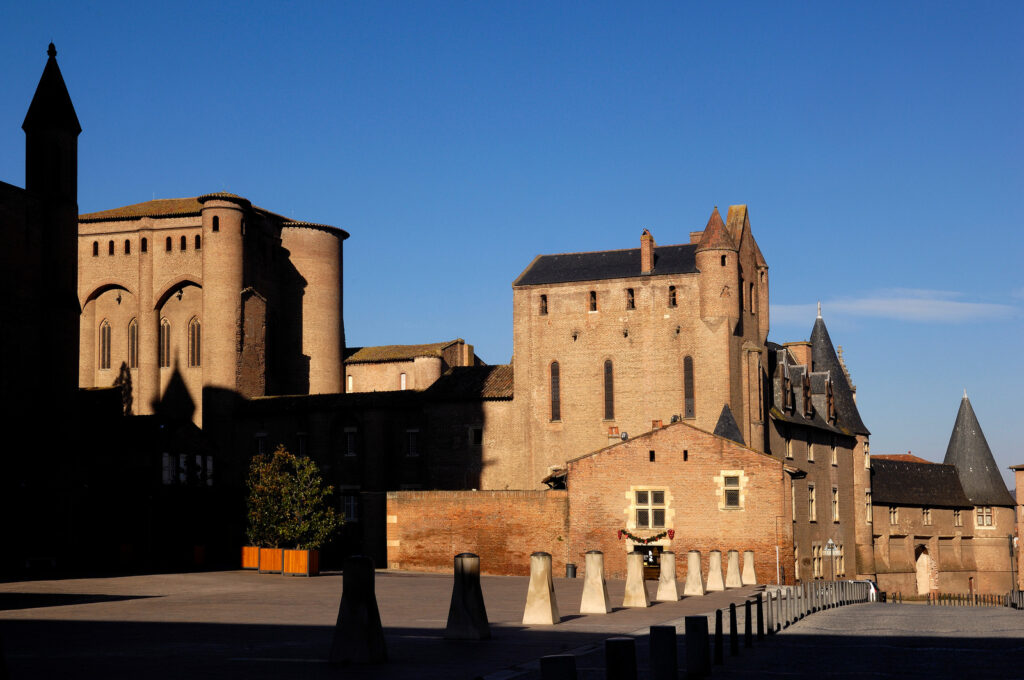 Palais de la Berbie in Albi, France (Albi Cathedral to the left)