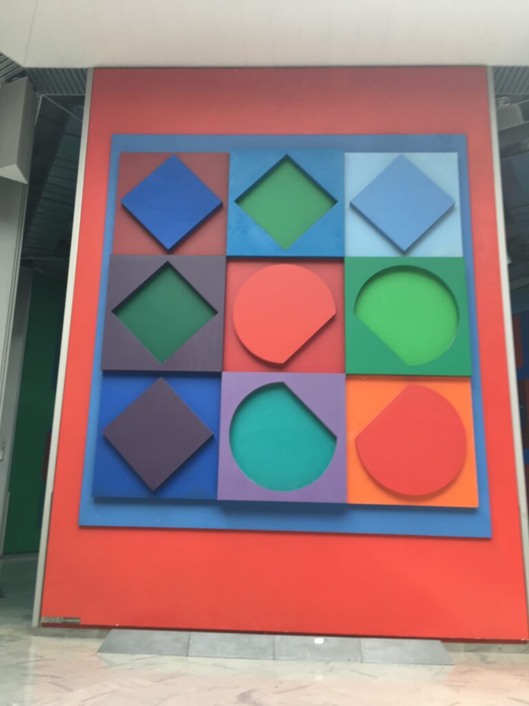 Large op art piece by Vasarely at the Fondation Vasarely near Aix-en-Provence, France - reds and multi-colors