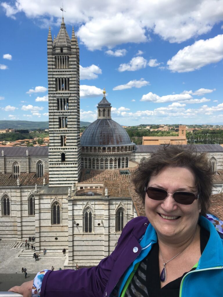 Carol Cram overlooking Siena Cathedral.