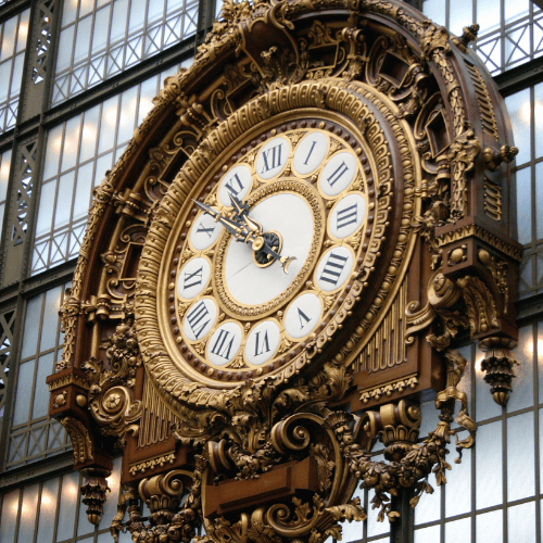 The large, ornate clock in the Musee d'Orsay in Paris, France