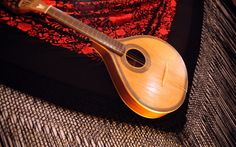 A fado guitar; see fado performances while traveling in Portugal