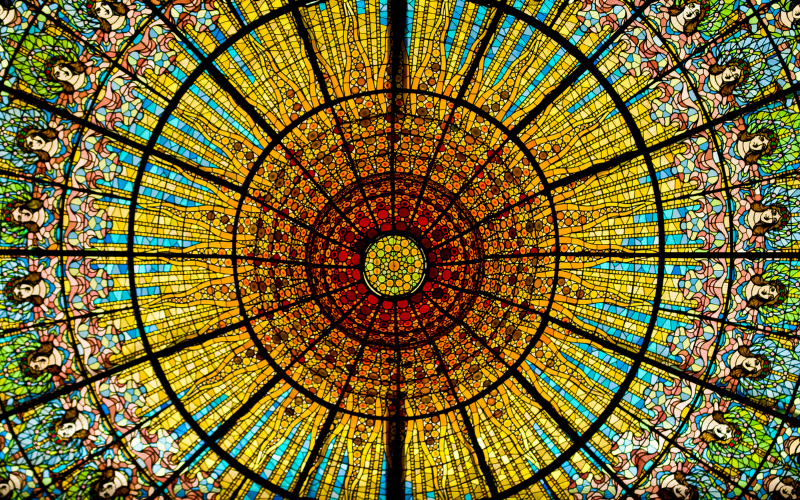 Stained glass ceiling of the Palau de la Musica Catalana in Barcelona, Spain, a stunning venue for  concerts and performances in Europe