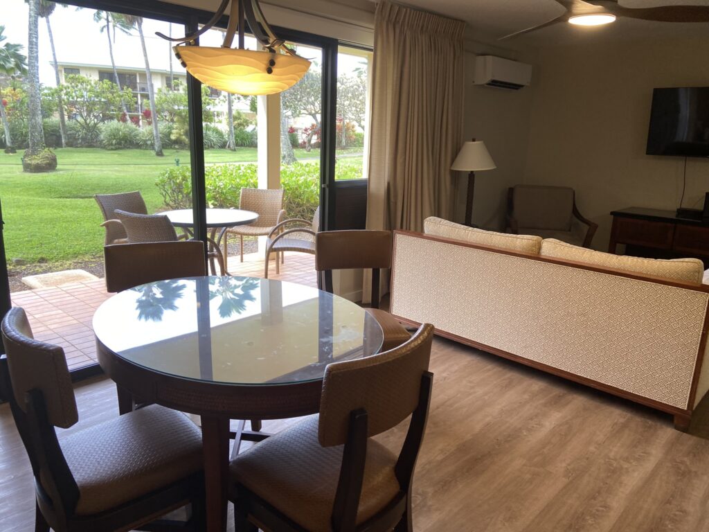 Living room, dining room, and garden view lanai - the one-bedroom suite at Kauai Beach Villas, great choice for the solo traveler.