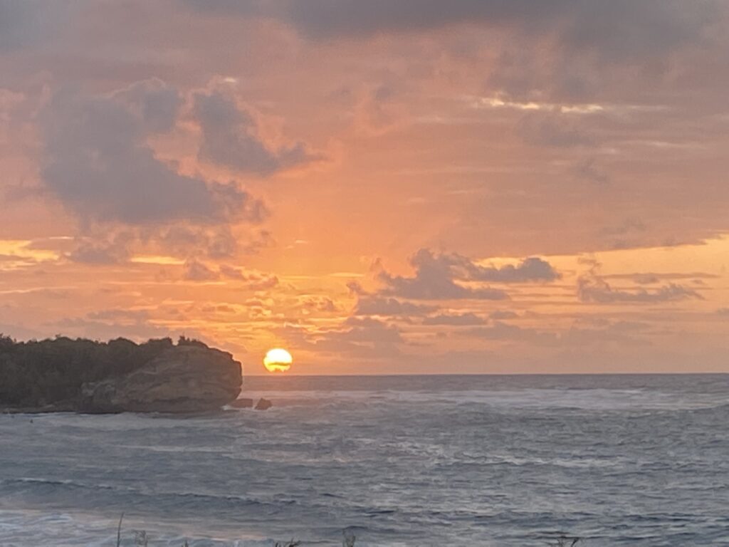 Sunrise over the Pacific Ocean seen from the South Shore of Kauai.