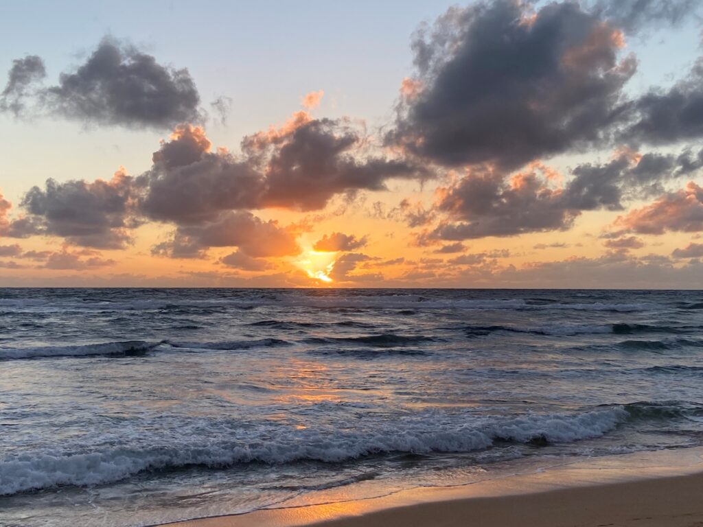 Sunrise over the Pacific Ocean seen from the East Coast of Kauai.
