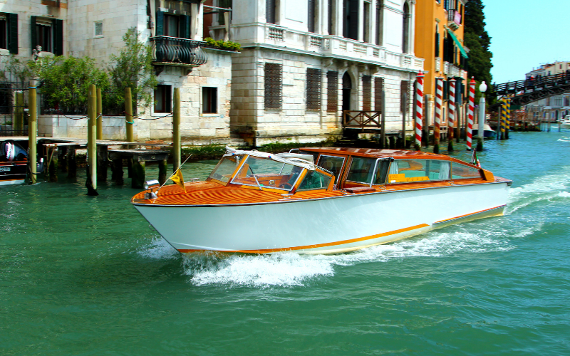 water taxi on the Grand Canal in Venice--sleek and expensive.