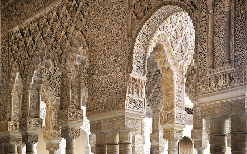 Ornate stonework in the Nasrid Palace in the Alhambra in Granada, Spain