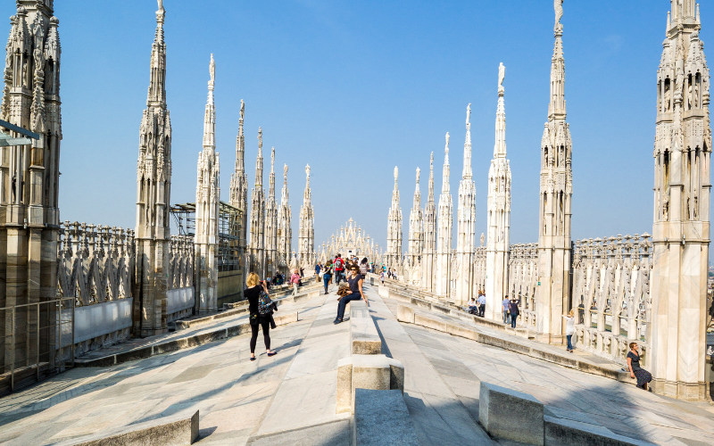 View of the rooftop of Milan Cathedral with thin, sculpted spires