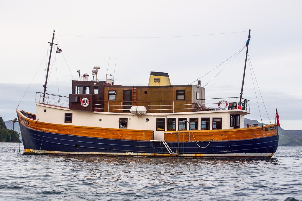 A boat called the Glen Tarsen, a converted Irish trawler used to take small group tours of the Hebrides in Scotland.