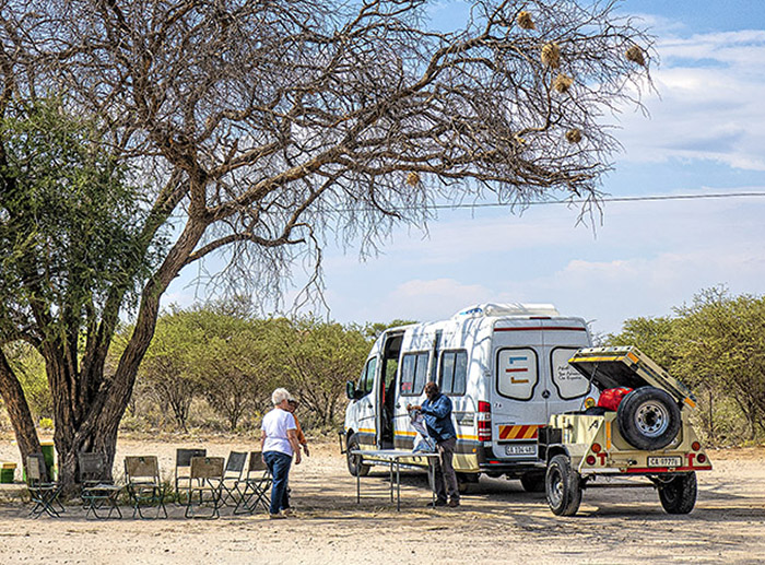 Mercedes Sprinter van used to transport small group tours on safari in Africa.