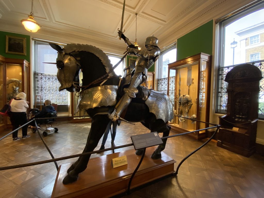  A statue of a horse with a man in armor as part of the display of armor at the Wallace Collection in London
