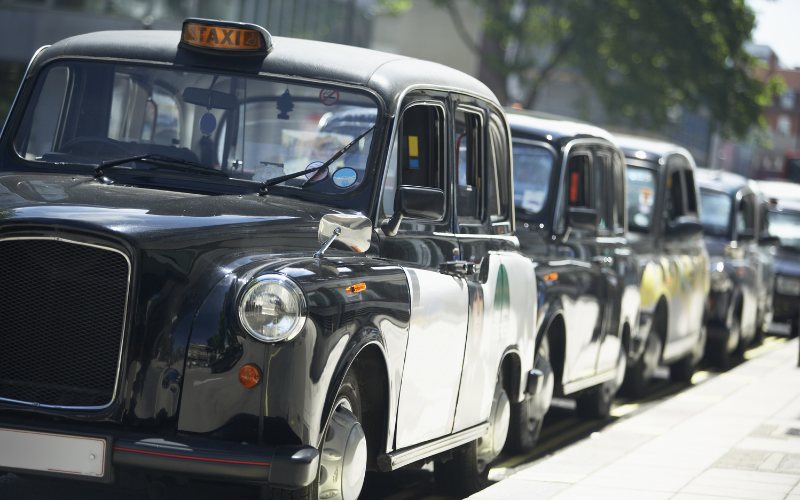 Line of black cabs in London