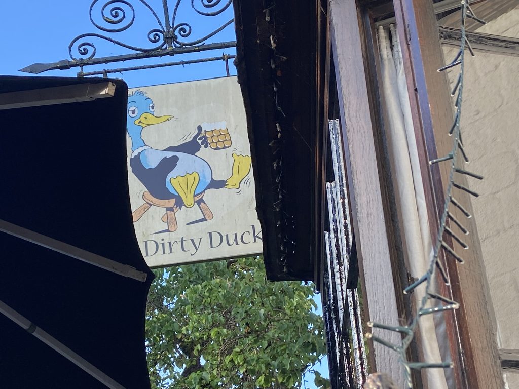 Sign for the Dirty Duck pub in Stratford-upon-Avon