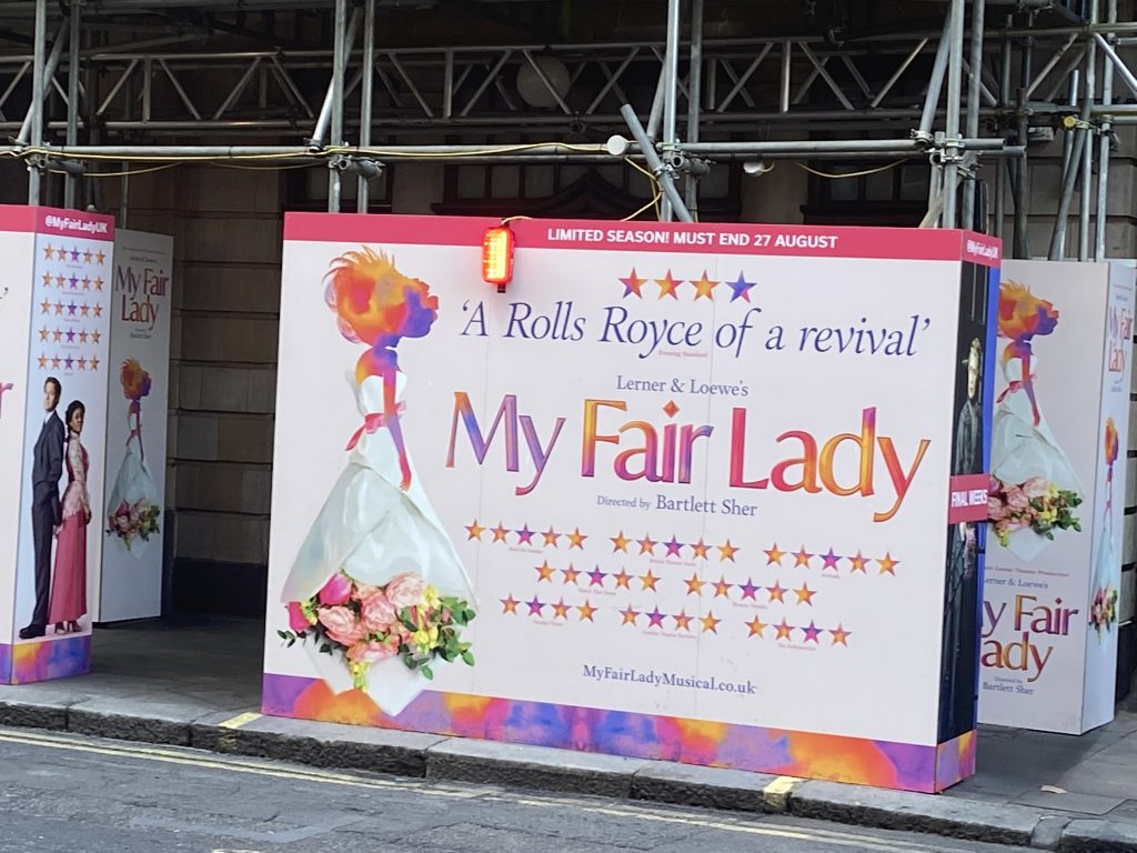 Large poster for My Fair Lady playing at The Coliseum in London