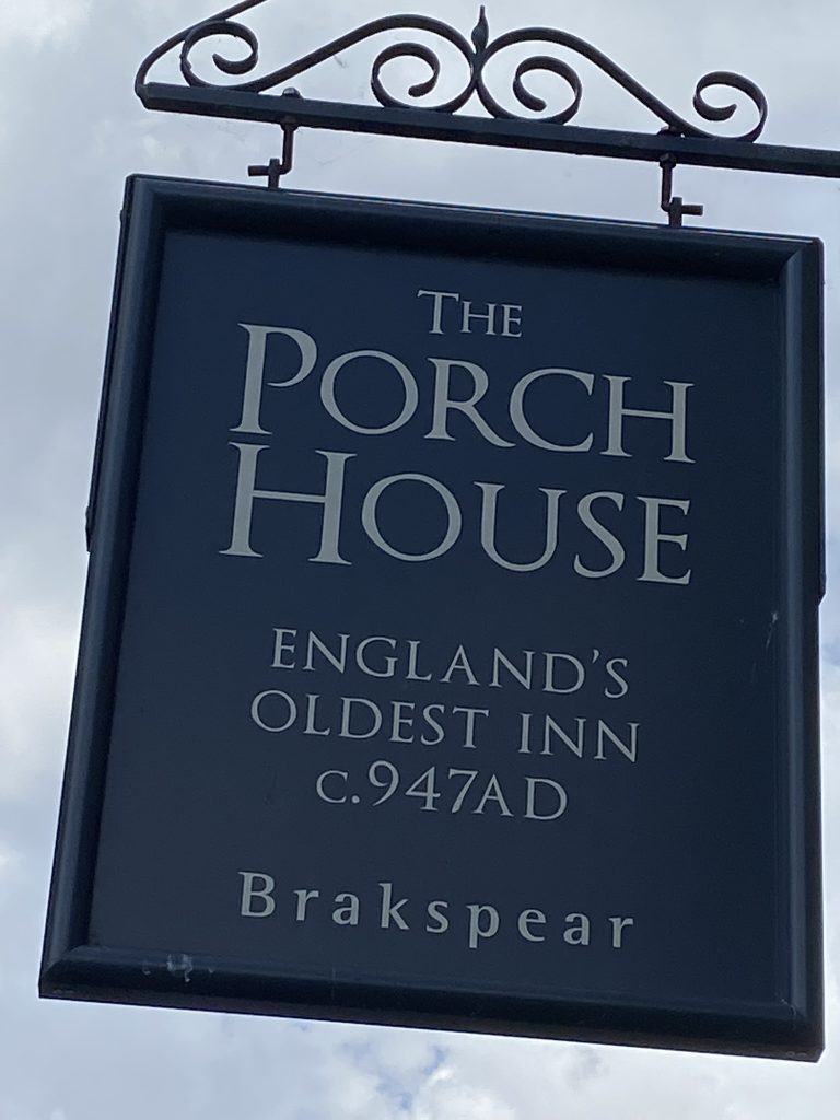 Sign for the Porch House inn - oldest in England