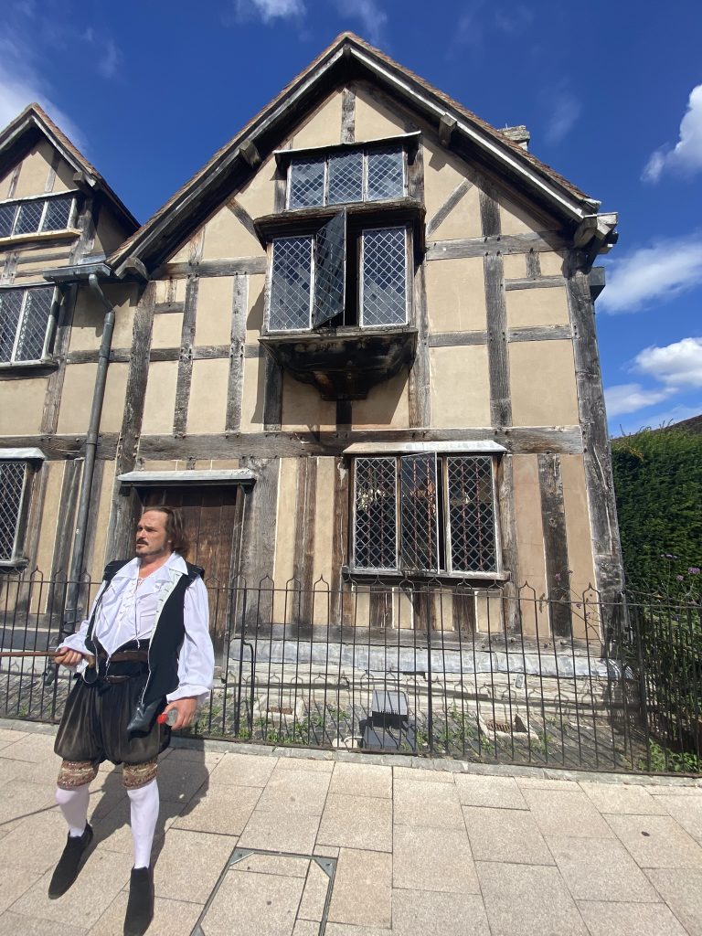 Tudor Wolrd Guide dressed as Shakespeare in front of "Dad's House" - his birthplace in Stratford-upon-Avon