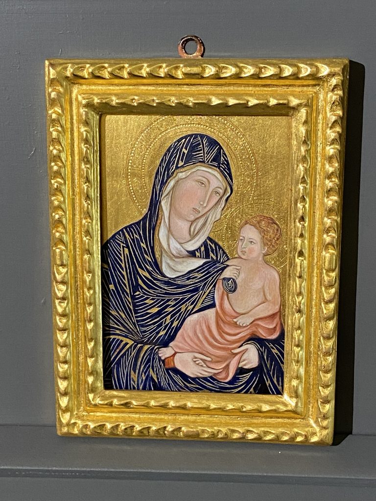 A gold painting of the Madonna and Child by Silvia Salvadori done in the medieval style