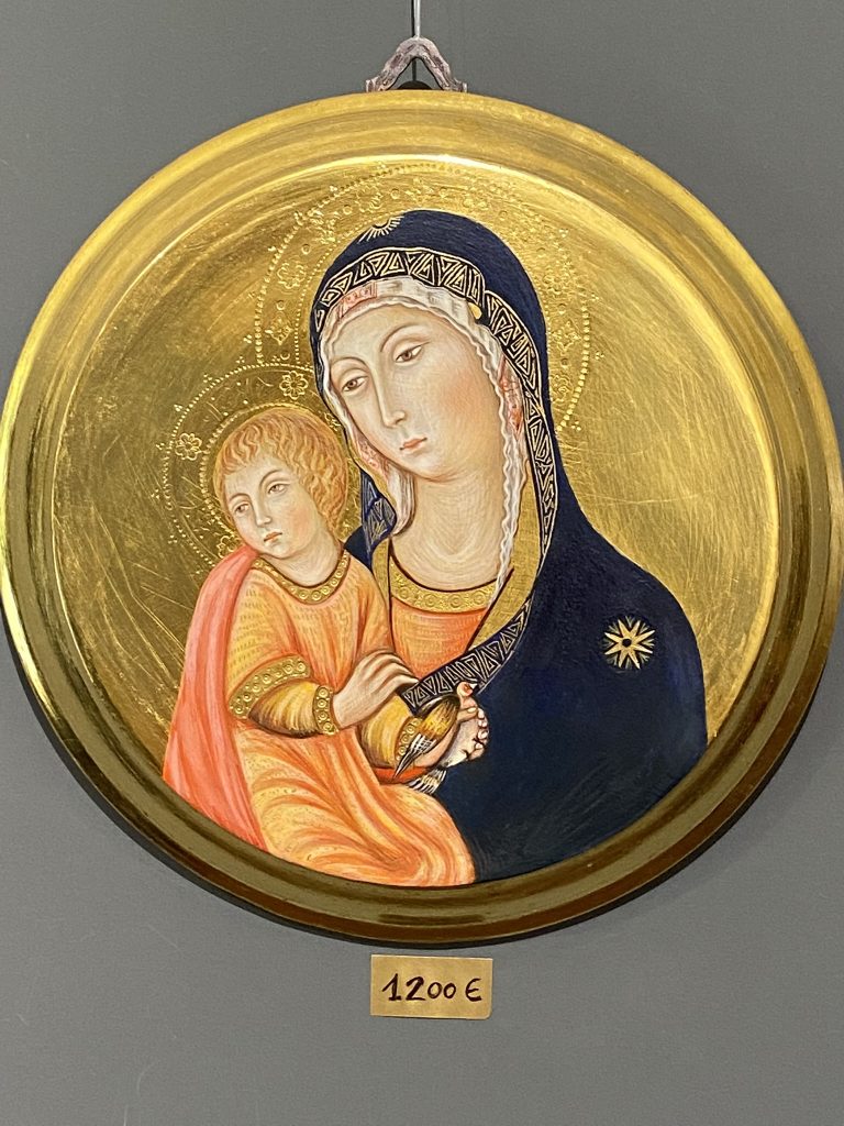 A small, circular gold painting of the Madonna and Child by Silvia Salvadori done in the medieval style