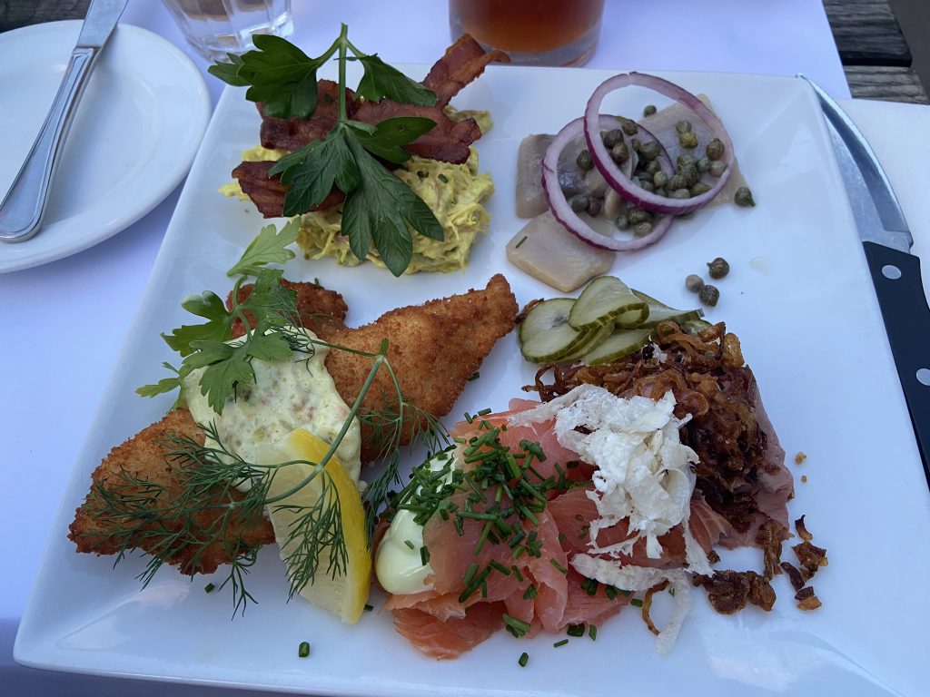 Four Smørbrød on a plate in Copenhagen