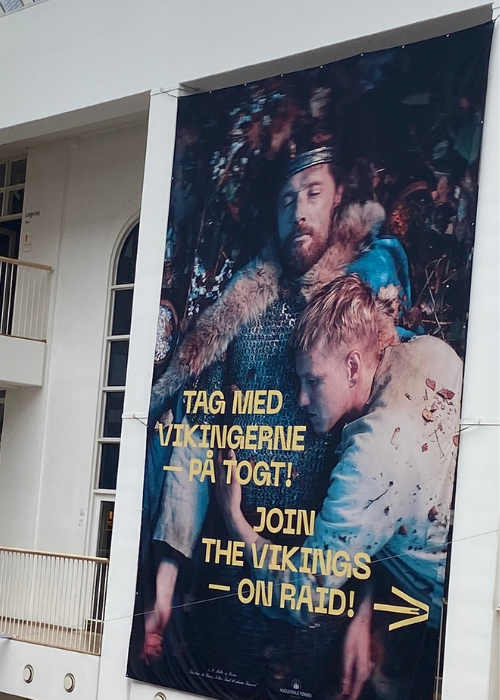 Poster for The Viking Raid attraction at the Danish National Museum