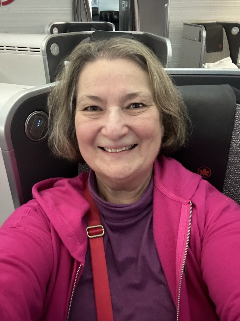 Carol Cram in first class on Air canada en route from Montreal to Costa Rica