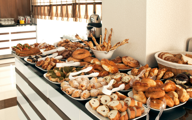 Breads and pastries at a buffet breakfast in Europe
