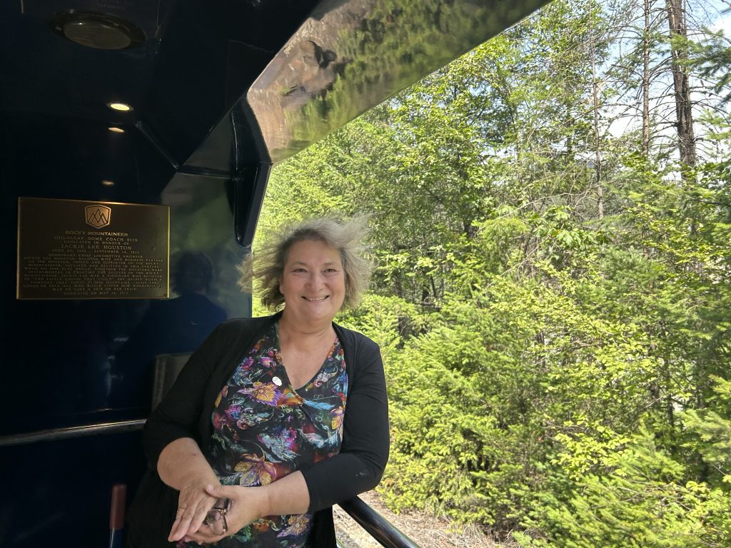 Standing on the viewing platform on the Rocky Mountaineer