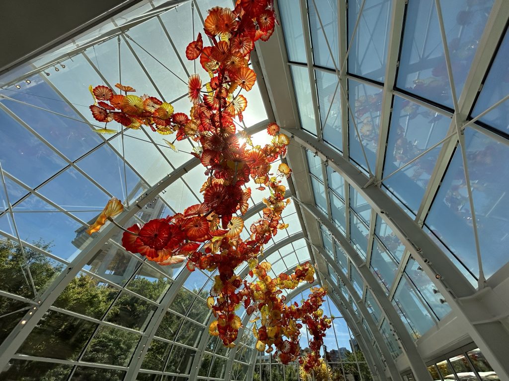 Massive glass sculpture in an atrium at Chihuly Garden and Glass in Seattle